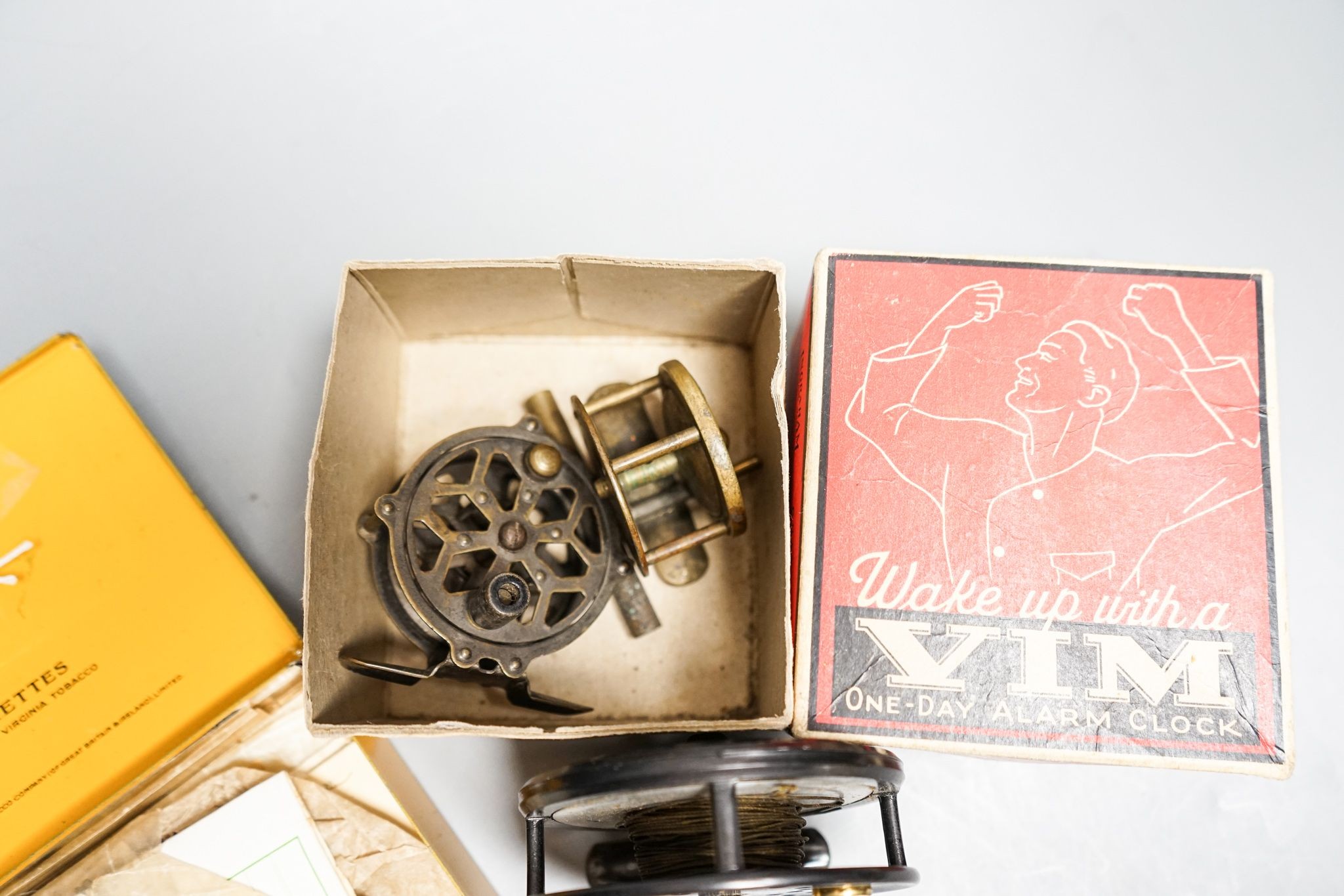 Three fishing reels, flies, lines etc